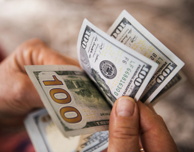 person counting money